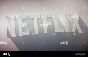 Netflix logo on a TV screen. Netflix Inc. is an American company founded specializes in and provides streaming media and video on demand online and DV Stock Photo - Alamy