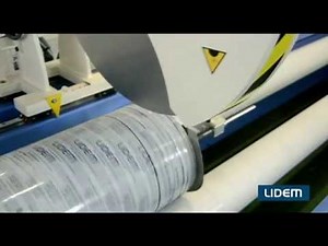 Automatic roll cutter or slitter for fabrics, nonwoven, paper and cardboard