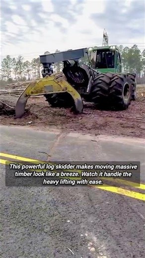 Powerful Log Skidder Hauling Heavy Timber Across Muddy Ground