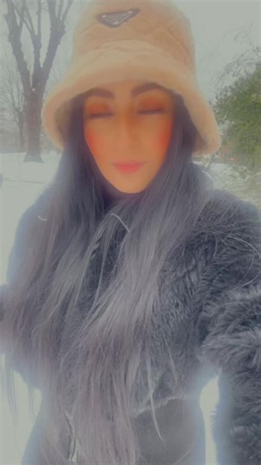 Enjoying Iced Coffee on a Snowy Day