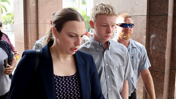 Teen charged with killing stepsister on Carnival Cruise arrives in court