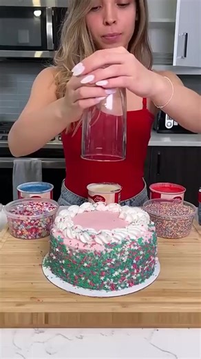 cakes_explodes_with_sprinkles_when_she_cuts_it_shorts | DazzleDrive