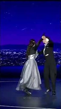 A humanoid robot dances the waltz with a human ;)