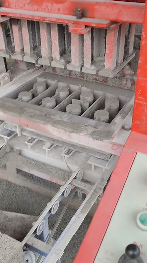 Concrete Block-Making Machine in Action