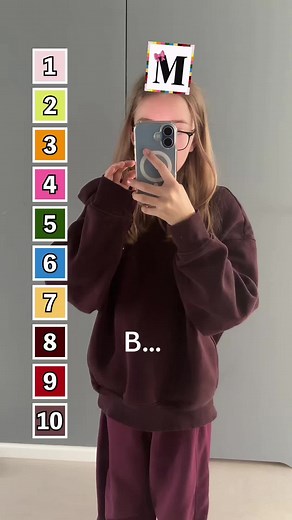 Person Interacting with Colorful Letter Blocks