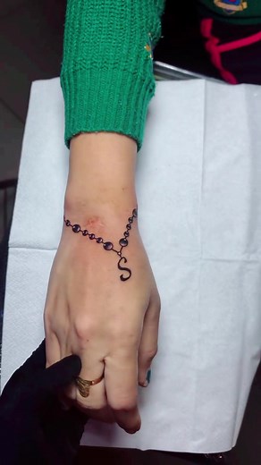 Beautiful hand chain style tattoo 😍 #fyp #foryou #foryoupage #unfreeze #unfreezemyacount #account #grow #views #100k #500k #viral #viraltiktok #viralvideo #viral_video #tattoo #tattoos #karachi #karachipakistan #sstattoostudio #sstattoostudiokarachi