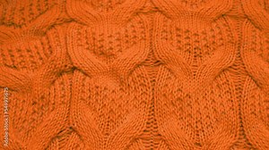 Orange Knitted Cotton Texture Soft Warm Fabric with Pattern Sweater Plaid Bedspread Clothes, Macro, Close-up. Orange Knitted Cozy Textile, Yarn, Abstract Orange Knitted Background. Knitting, Material.