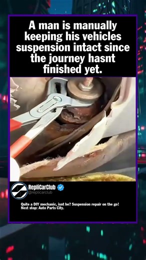 A man is manually keeping his vehicles suspension intact since the journey hasnt...