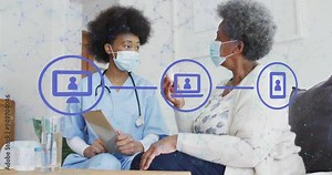 Healthcare communication animation over doctor and patient discussing medical information Stock Video
