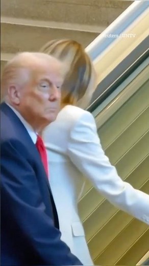 Awkward moment Trump is forced to climb broken escalator he blasted in UN speech