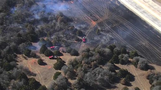 WATCH: Sky 5 flies over grass fire that threatened home near Newcastle
