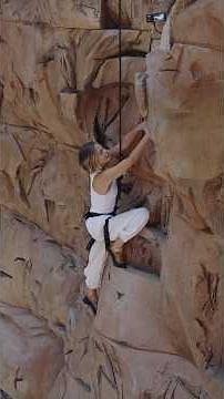 CHARLIZE'S TIME SQUARE BILLBOARD CLIMBING STUNT