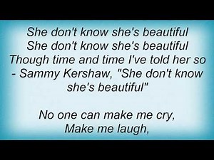Alan Jackson - She Don't Know She's Beautiful Lyrics