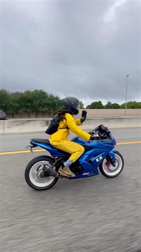 Biker in Action: High-Visibility Gear for Safety in Any Weather! 🌧️🚴‍♂️