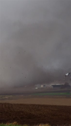 PURE PANIC: Watch as the small community of Minden, Iowa takes a direct hit from this violent tornado. During this chase we had @nelkboys with us on their first ever storm chase, which turned out to be a historic but devastating day. #weather #stormchasing #tornado #twister #iowa | Storm Chaser Jordan Hall