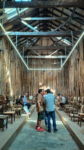 SCALE on Instagram: "Ibrahim Mahama recently titled as the most influential artist of 2025,(b. 1987, Tamale, Ghana) works with what the world leaves behind. Used jute sacks, discarded furniture, abandoned warehouses, and obsolete materials become the core of his large-scale installations. Objects once tied to labour, trade, and transport are transformed into spaces for reflection about history and power struggles. Ibrahim's work looks closely at Ghana’s colonial past and its ongoing economic rea