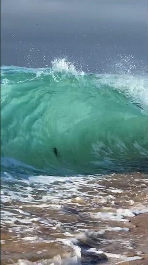 Slow-Motion Wave Breaks at Sunrise on a Sandy Shore 🌊