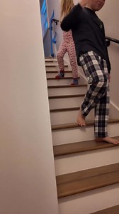 Here’s a little peek at the kids coming downstairs this morning. We tape the top of the stairs so they can’t come down early. 😂 | Chris Smith