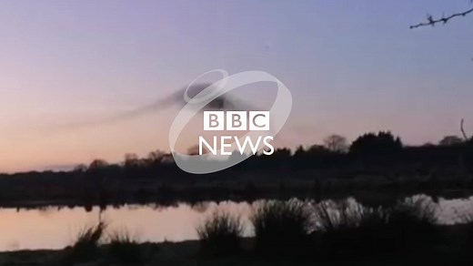 Nature lovers and photographers are heading to Whixall Moss, near Whitchurch in north Shropshire, to watch up to 80,000 starlings in a daily murmuration. This footage was captured by Chris Burrage, who runs the Wildlife in Whixall Facebook page. | BBC Birmingham