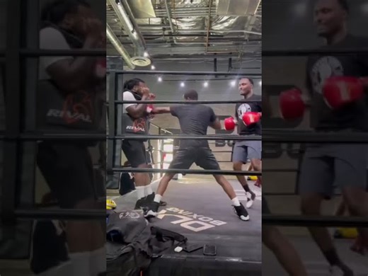 Bruce Carrington & Kenneth Sims act out how boxers behave when coach puts on a body guard