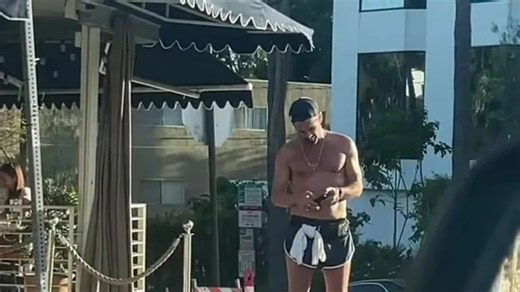 Fans shocked as they spot Hollywood star texting topless outside a coffee shop