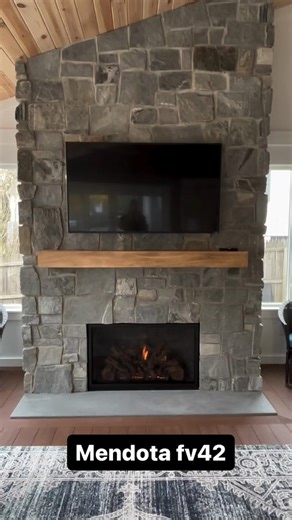 Freshly installed and already making a statement. 🔥 The Mendota FV42 is known for its exceptional heat output, and ultra-realistic flame all wrapped in a clean, modern design. Installed into this beautiful stone surround, it instantly becomes the centerpiece of the room while still feeling right at home. | Mendota Hearth Gas Fireplaces & Inserts