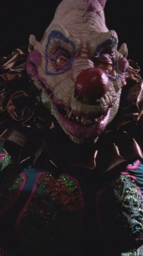 Horror Empire 💀 on Instagram: "🤡 In space, no one can eat a cotton candy cocoon! 🍿 "Killer Klowns from Outer Space" (1988) is not just a movie; it’s a neon-soaked, popcorn-flavored nightmare that redefined the "horror-comedy" subgenre. Directed by the visionary Chiodo Brothers, this film is the ultimate testament to the power of practical effects and pure, unadulterated creativity. Whether you have a phobia of clowns or you just love 80s cheese, this masterpiece is a mandatory watch for every