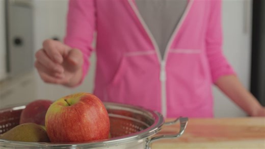Chopping fruit for a salad - Free Stock Video