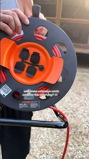 Retractable extension cord reel that keeps your garage organized and eliminates tangled cords