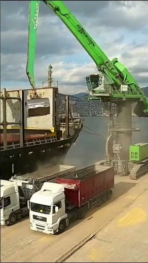 Unloading Cargo Ship with Excavator Crane