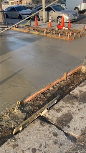 Pouring & Finishing an ADA Handicap Concrete Parking Pad #shorts #concrete #construction #parking