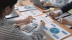 Carbon offset price report CO2 emission. Future growth Net zero waste in ESG office protect climate change global warming social issues project. Group asia woman people SDGs plan team talking workshop