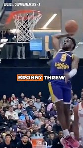 Watch Bronny James catch a body with a monstrous dunk! Dad LeBron couldn't be prouder as he cheers from afar. #BronnyJames #LeBronJames #Lakers #NBA | Basketball Buzz