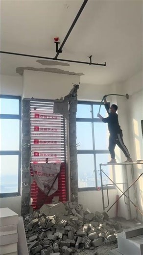 Structural Pillar Demolition: Manual Hammering Technique