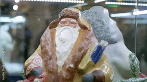 Soviet vintage santa claus (ded moroz) figurine on display in shopping mall. Close up.
