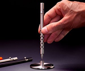 The Titanium Injector Pen   Dock Are a Sleek Addition to Any Desk