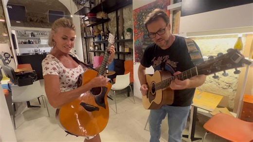 OKLAHOMA! It’s Midnight in Italy! So on our walk home, what does Marla do?? She grabs a guitar from a local street band and starts playing!! THAT, is exactly WHY she is Made In Oklahoma Marla! #MIOMarla #OkieERNurse #BristowKid #Oklahoma #Italy 9.9.25 💯 | Mike Morgan