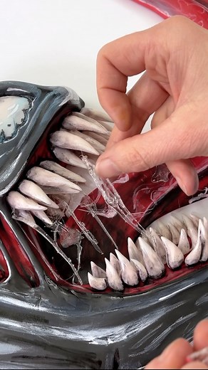 Zoe Hopkinson on Instagram: "We are Venom 🎥 Such an awesome character to recreate in cake 🎂 I had so much fun with the SALVIA 😂 In cinemas now 😀 @venommovie @sonypicturesuk Thanks to @_doaly for the art inspiration - make sure to check out his work 😊 #venom #venomthelastdance #cake #sony #cakedecorating #movie #film #comicart #creative #tomhardy"