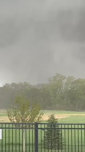 A man from Elkhorn, Nebraska, captured video of a tornado moving through his backyard. At one point, he said it was "a couple hundred yards" from his house. | WYFF News 4