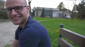 Man saying goodbye to someone. The camera turn around.