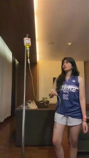 IV Infusion Demonstration in Modern Living Room