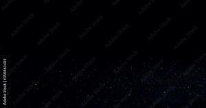 Water drops dripping on down creating a wave on a black background
