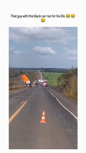 powerfulwepon on Instagram: "The video depicts a fuel tanker engulfed in flames on a rural highway, with bystanders filming casually until a black car arrives; its driver leaps out and sprints away, humorously underscoring explosion risks that others ignore. Posted January 7, 2026, by@powerfull weapons , a Zimbabwe-based content creator known for viral humor, the clip amassed 8 million views and 33,000 likes in under 24 hours, fueled by relatable "fight-or-flight" reactions. Replies highlight hu