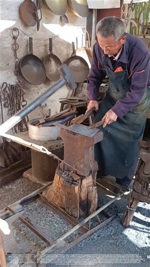 How does a blacksmith cut steel plates single-handedly?