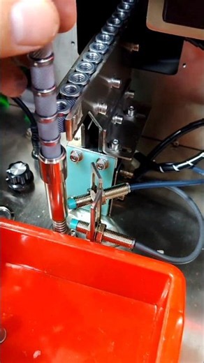High-Speed Thread Tapping of Metal Nuts on an Assembly Line