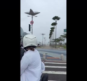 Hyper-localised rain covers half the street and the rest stays dry