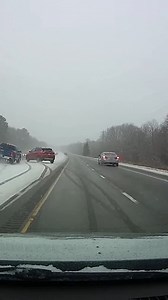 Sudden Ice Causes Multi-Car Pileup on I-40 Asheville, North Carolina — February 26, 2025 A sudden onset of freezing rain and light snow turned a stretch of Interstate 40 into a hazardous zone Friday morning. Commuters were caught off guard as visibility dropped and road surfaces became slick, leading to a dramatic multi-vehicle collision captured on a dashboard camera. The footage shows a white sedan already stranded on the snowy shoulder when the situation escalates. A blue pickup truck and a b