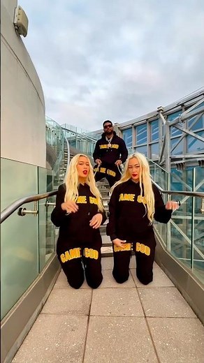 MAN WALKS WOMEN ON LEASH (GAME GOD GOLDIE)