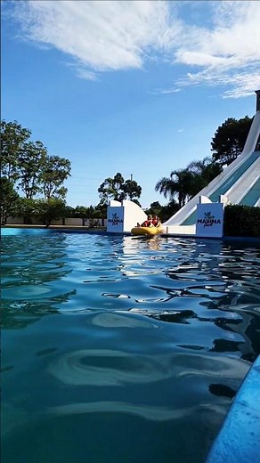 High-speed tube slide descent with a water splash launch. #waterslide #waterpark#themedwaterpark