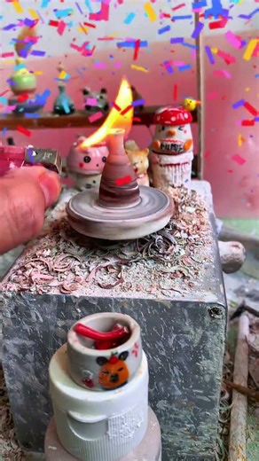 The process of making a small flower-shaped vase with a twisted form in fingertip pottery#